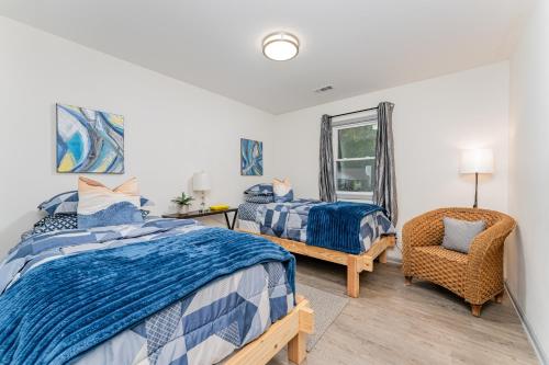 En eller flere senge i et værelse på Cozy Escape 908