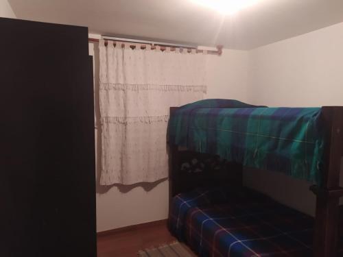 Postel nebo postele na pokoji v ubytování Acogedor Apartamento en Duitama