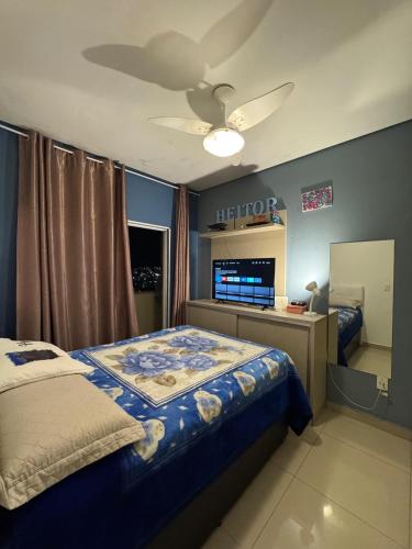 En eller flere senge i et værelse på Apartamento Familiar Para Suas Férias