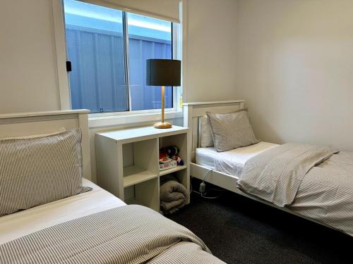 Postel nebo postele na pokoji v ubytování Dunes Purple at Robe