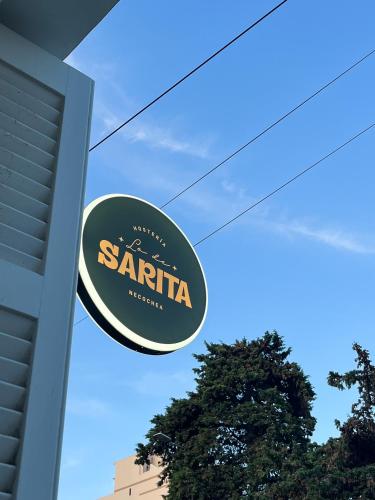 ein Schild für ein Santa Ana Restaurant in der Unterkunft Lo de Sarita Hostería in Necochea