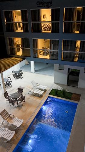 an overhead view of a building with a swimming pool at Catamarã Pé na Areia in Angra dos Reis