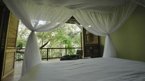 Ένα ή περισσότερα κρεβάτια σε δωμάτιο στο Montés Samaná