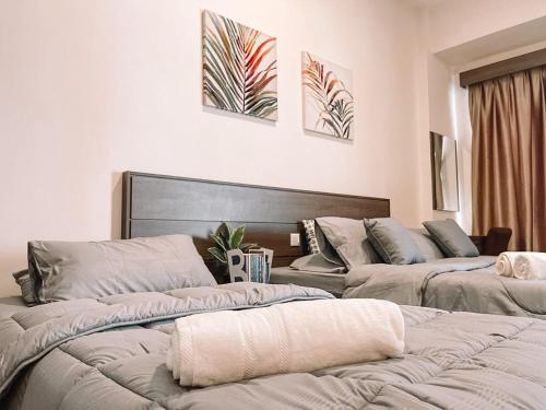 En eller flere senge i et værelse på Bayou Lagoon Waterpark