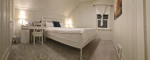 Ένα ή περισσότερα κρεβάτια σε δωμάτιο στο John's House in Vancouver West