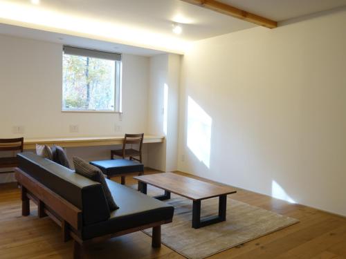 Χώρος καθιστικού στο Rinrei terrace 一棟貸切 シングルルーム6部屋 各部屋トイレ シャワー付