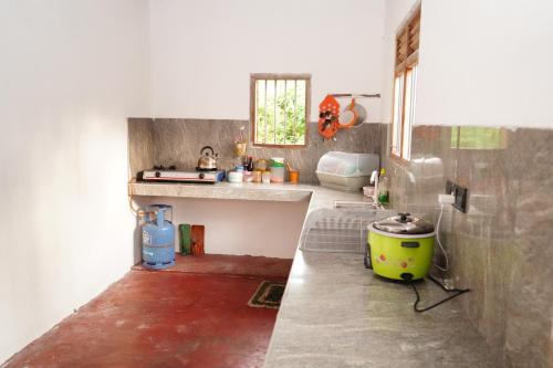 Η κουζίνα ή μικρή κουζίνα στο Aken House