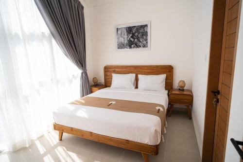 Postel nebo postele na pokoji v ubytování Swamis Villa