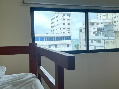 Ein Bett oder Betten in einem Zimmer der Unterkunft Modern apartment a few steps from the Salinas esplanade