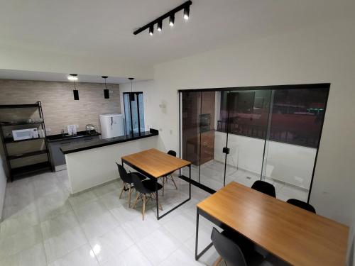 Kuchyň nebo kuchyňský kout v ubytování Sapucaia Flat - Apart Hotel