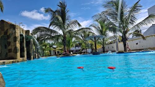 Bazén v ubytování Seaside cabin in Arboletes Galilea nebo v jeho okolí