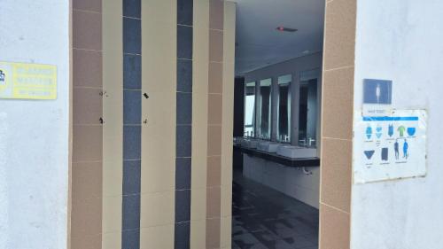 Ένα ή περισσότερα κρεβάτια σε δωμάτιο στο 2-9pax FAMILY SUITE, i-CITY, Shah Alam, Beside Theme Park, WIFI 50-55"TV