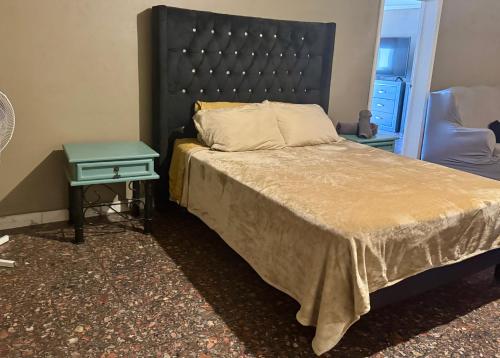 Postel nebo postele na pokoji v ubytování SUITE 4, Centro de Cuauhtemoc Chihuahua