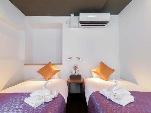 Postel nebo postele na pokoji v ubytování Hotel S-Presso Central - Vacation STAY 9443