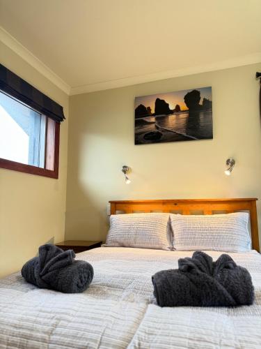 Postel nebo postele na pokoji v ubytování Whispering Pines