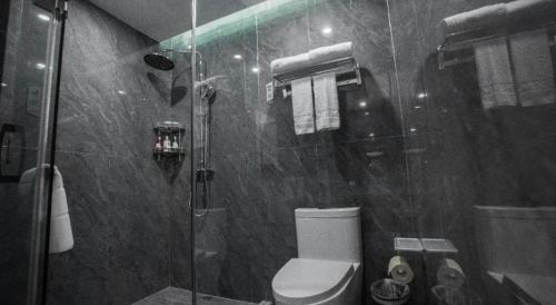 Koupelna v ubytování Borrman Hotel Zoucheng Huamaowan Mall