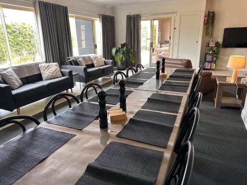 a room with a table with chess pieces on it at Austral Place 88 via Merri River in Warrnambool