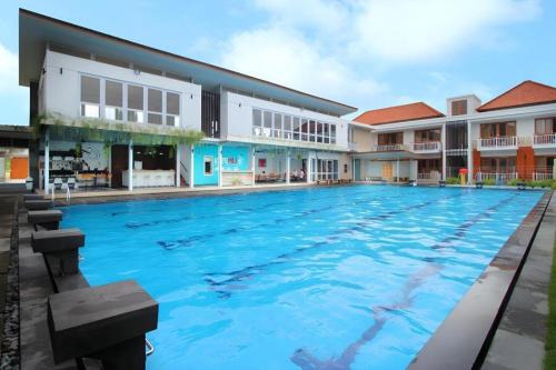 Bazén v ubytování Umah Bali Suites nebo v jeho okolí