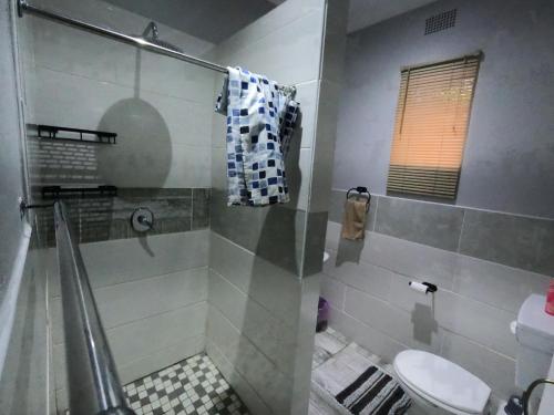 Koupelna v ubytování Makhonjwa Rose Barberton