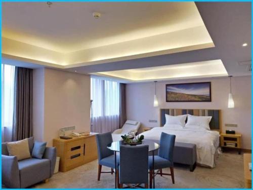 Postel nebo postele na pokoji v ubytování GreenTree Eastern Bijie Qixingguan Zhaoshanghuayuan Hotel