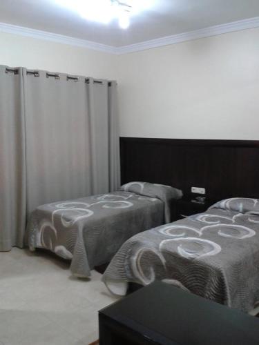 Cama o camas de una habitación en Hotel de la Mediterranee