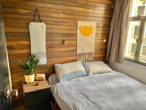 Ένα ή περισσότερα κρεβάτια σε δωμάτιο στο Cozy & Quiet 1BR - Sai Ying Pun