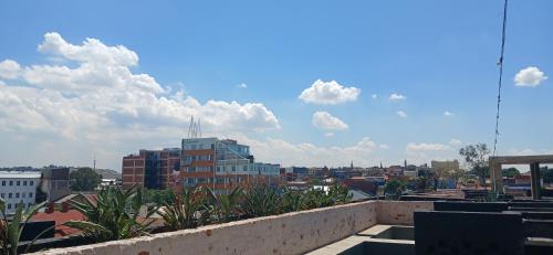 a view of a city from the roof of a building at Stylish Bachelor with Oak Floors & View in Johannesburg