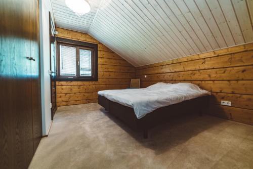 Postel nebo postele na pokoji v ubytování Rannatamme Villa