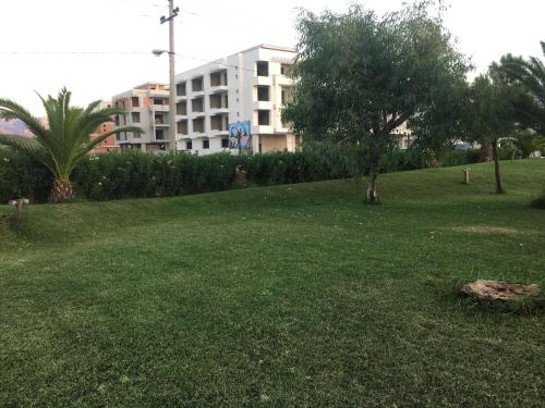 Zahrada ubytování Beachfront Apartment