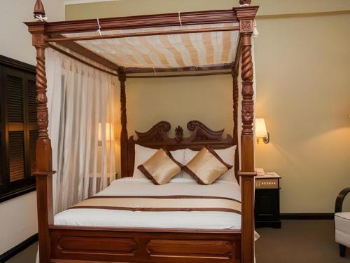 Postel nebo postele na pokoji v ubytování Summit Hotel Subang USJ