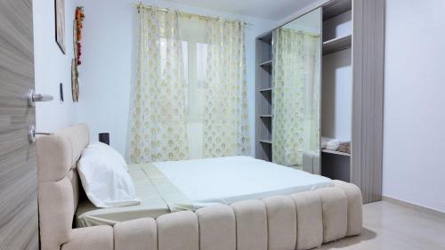 Ένα ή περισσότερα κρεβάτια σε δωμάτιο στο Résidence Maison des Anges