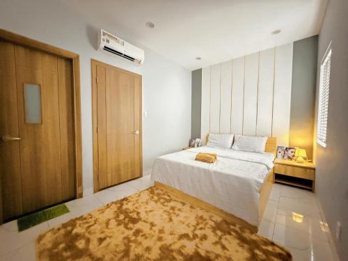 Ένα ή περισσότερα κρεβάτια σε δωμάτιο στο LV TPHomes