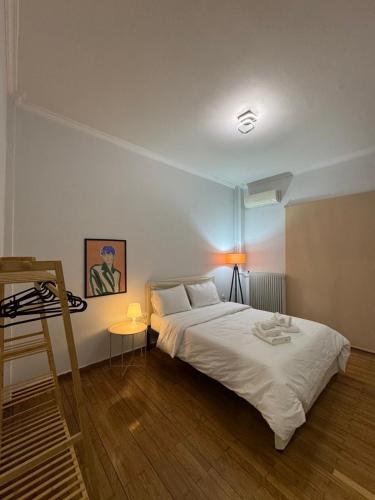 Ένα ή περισσότερα κρεβάτια σε δωμάτιο στο Patras City Stay 4