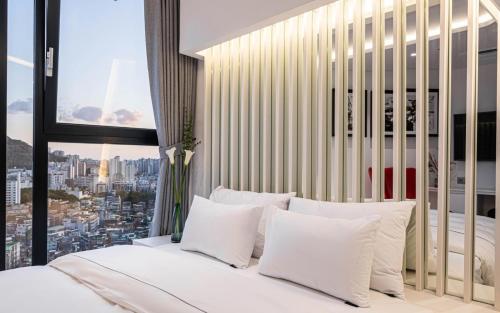 Ένα ή περισσότερα κρεβάτια σε δωμάτιο στο Forestar Hotel