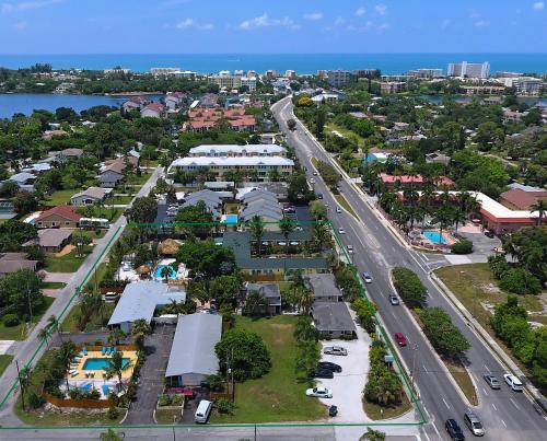 an aerial view of a city with a road and houses at Siesta Key Palms Resort in Sarasota
