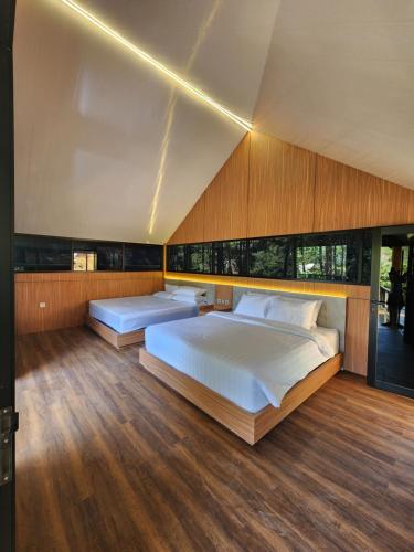Ένα ή περισσότερα κρεβάτια σε δωμάτιο στο Inspira Cabin