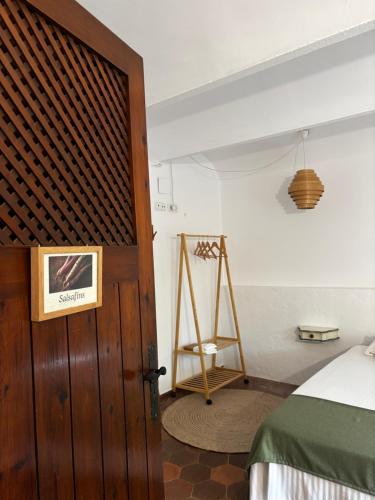 Ένα ή περισσότερα κρεβάτια σε δωμάτιο στο Mas Ribas Hotel i Esdeveniments