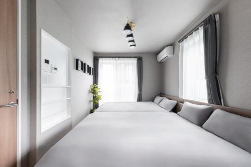 Postel nebo postele na pokoji v ubytování The Obsidian