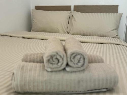 En eller flere senge i et værelse på SIAM LOUNGE - Pratumnak