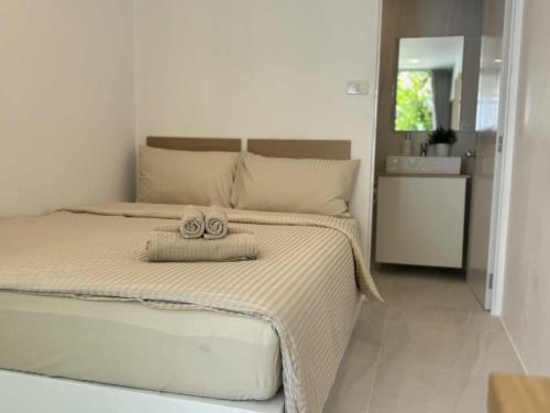 En eller flere senge i et værelse på SIAM LOUNGE - Pratumnak