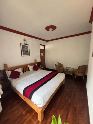 Postel nebo postele na pokoji v ubytování Eco Home Kathmandu