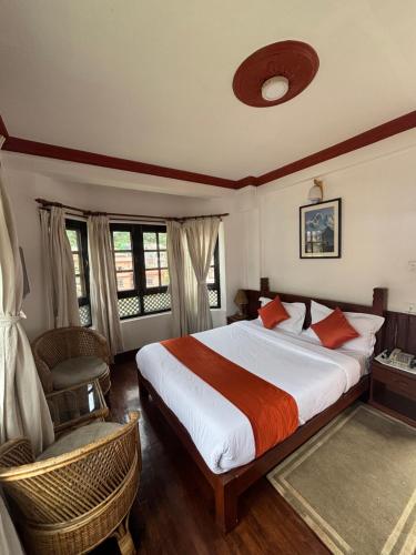 Postel nebo postele na pokoji v ubytování Eco Home Kathmandu