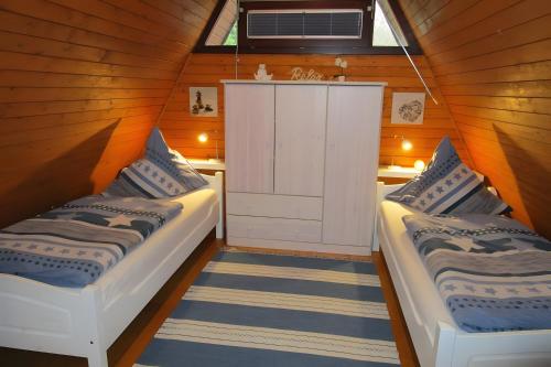 Postel nebo postele na pokoji v ubytování Ferienhaus Zum Vennbiber