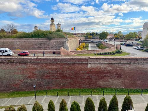 a large brick wall with a skate park on it at Dante Residence in Alba Iulia
