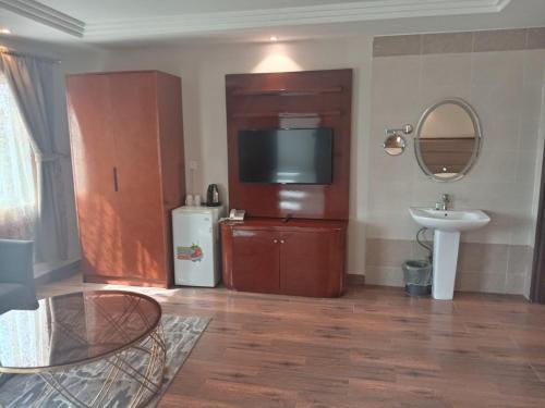 Vannituba majutusasutuses شقق خزامى المخدومه