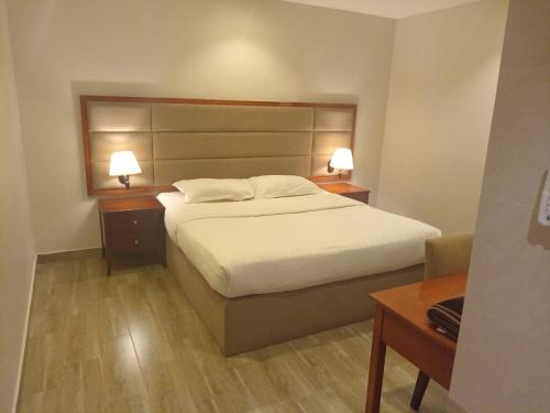 Voodi või voodid majutusasutuse شقق خزامى المخدومه toas