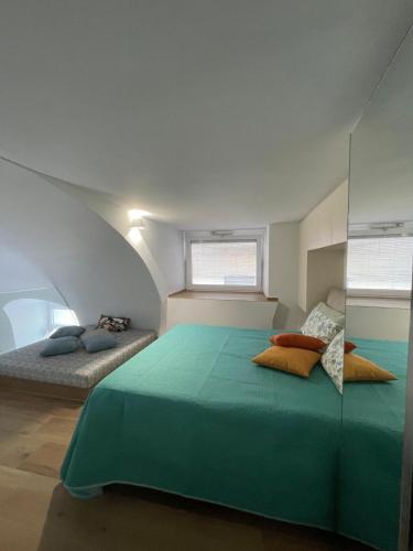 Ένα ή περισσότερα κρεβάτια σε δωμάτιο στο Casa di zia Nunzia