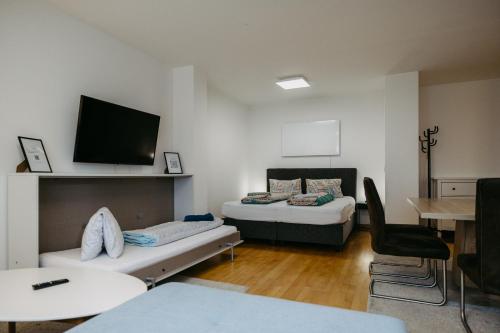 Ένα ή περισσότερα κρεβάτια σε δωμάτιο στο Ferienwohnung Dado