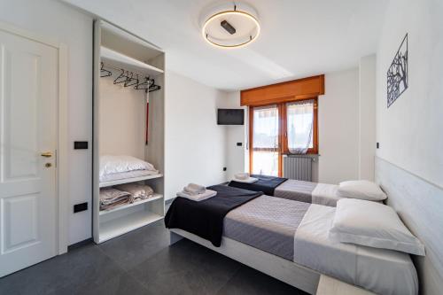 Ένα ή περισσότερα κρεβάτια σε δωμάτιο στο Da Cichin 1 - Free Parking, Wi-Fi & AC