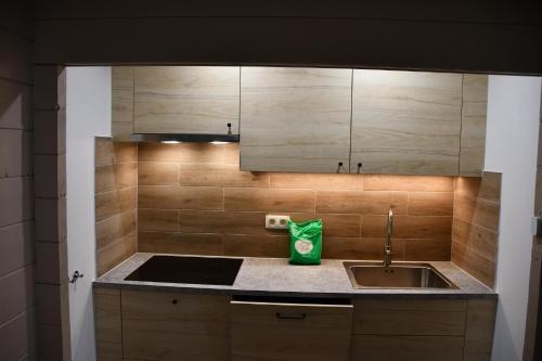 Η κουζίνα ή μικρή κουζίνα στο ArdenParks PetiteSuisse Chalet Renardeau